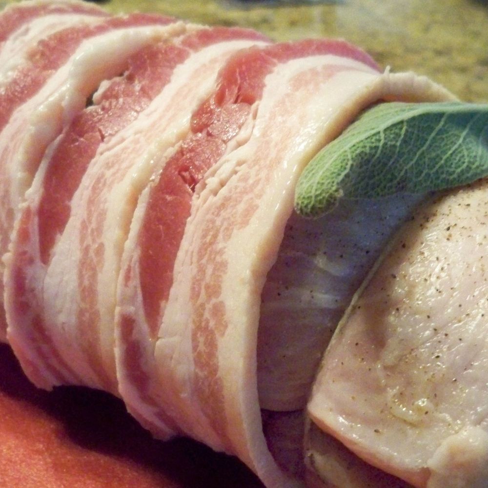 Bacon wrapped pork loin stuffed with walnuts and rice