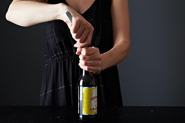 Opening a beer from Food52