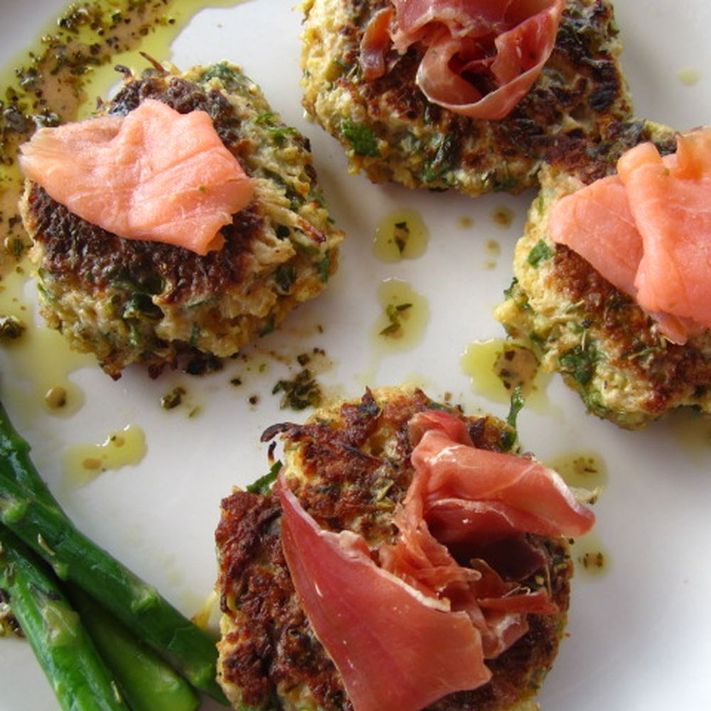 cauliflower fritters with smoked salmon, prosciutto herbed dressing.