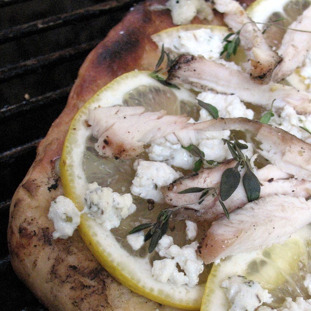grilled meyer lemon pizza with chicken, goat cheese and thyme