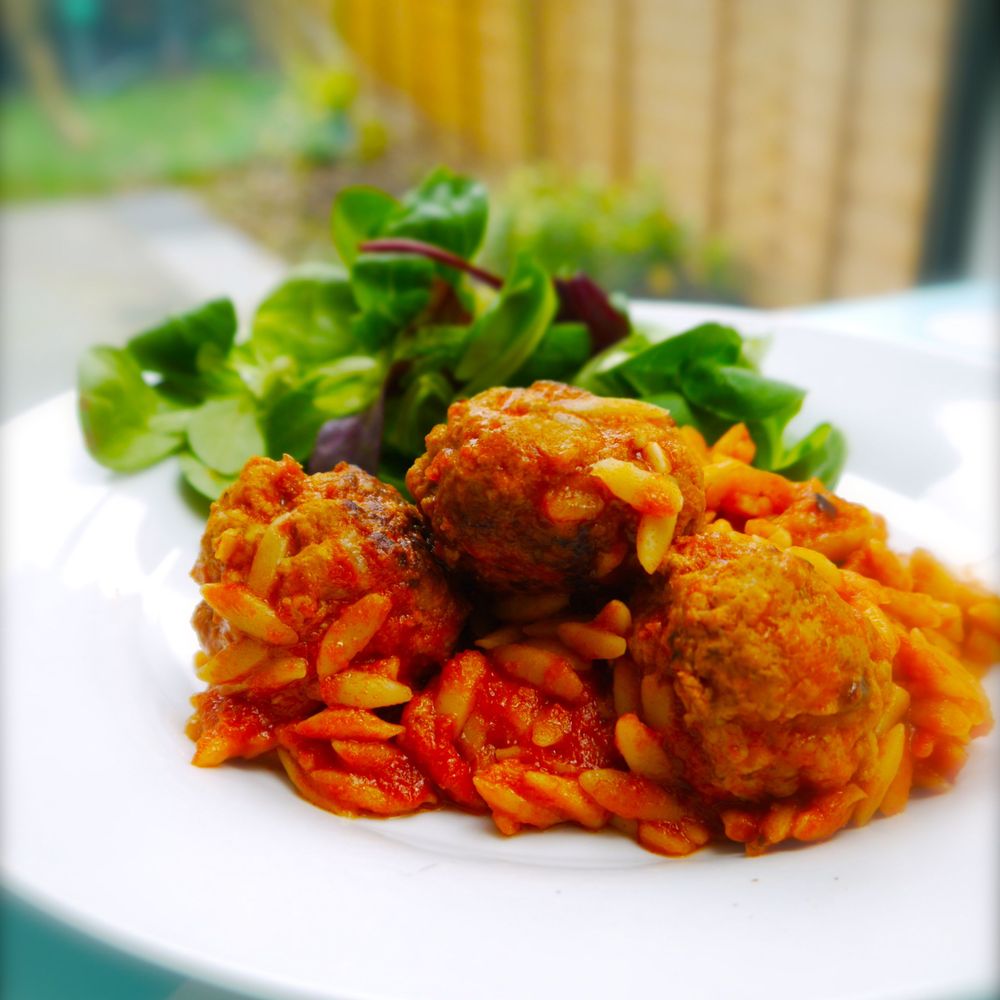 deeply-fragrant pork and fennel meatballs with oven-baked orzo