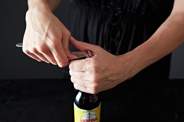 opening a beer from Food52