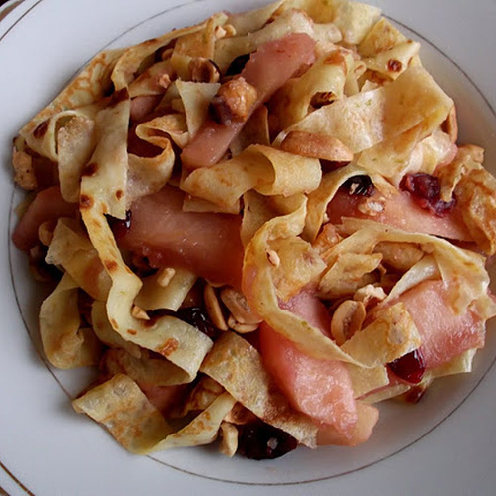 breakfast crepes with caramelized apples, cranberries and nuts