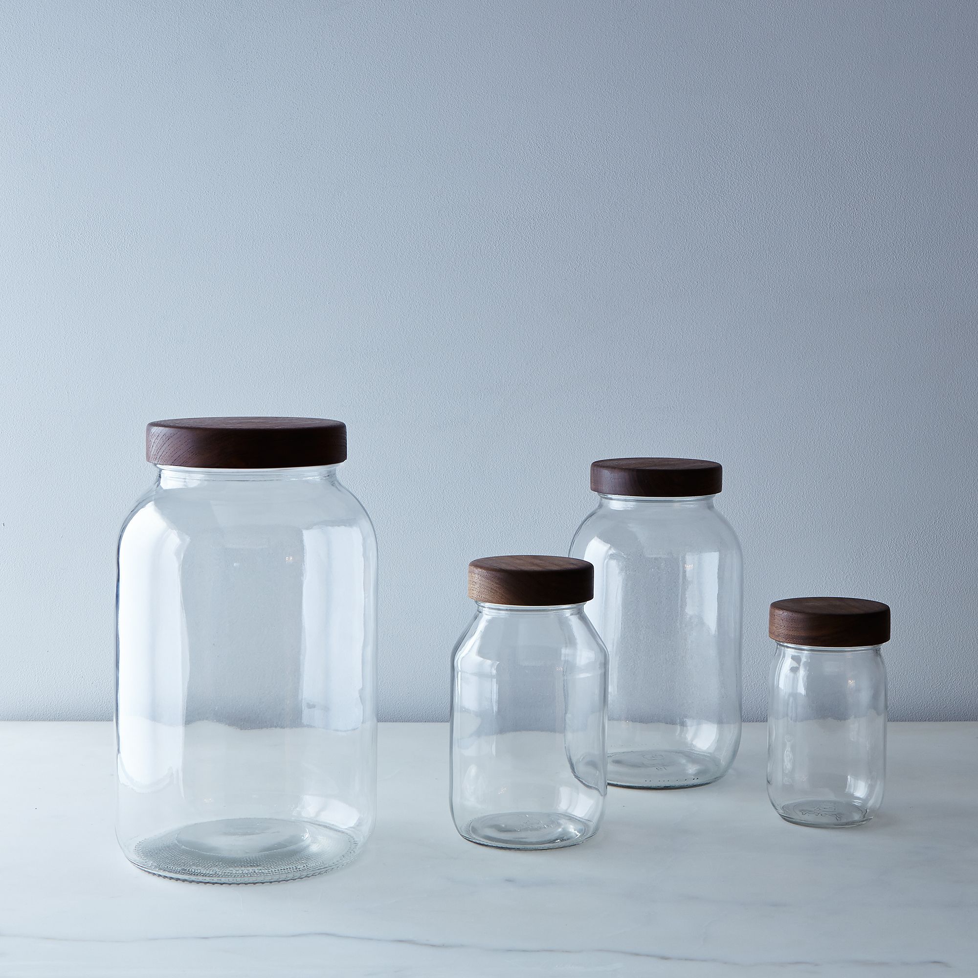 recycled food jars turned storage jars with glass knob tops