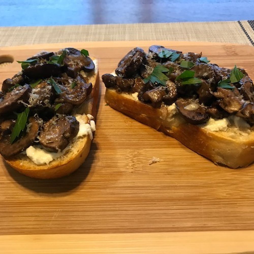 Mushroom toast with goat cheese, parmesan, shallot, garlic & herbs