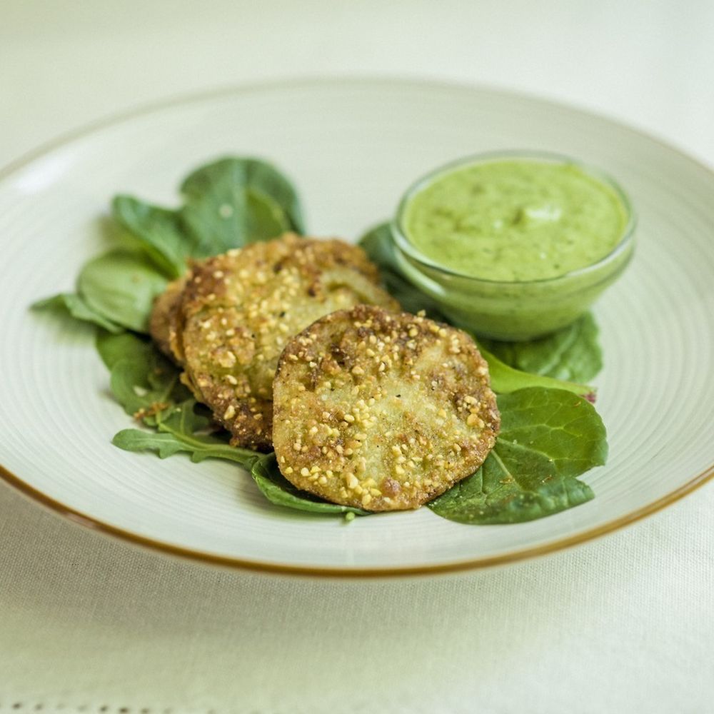 Fried green tomatoes with avocado-herb dressing
