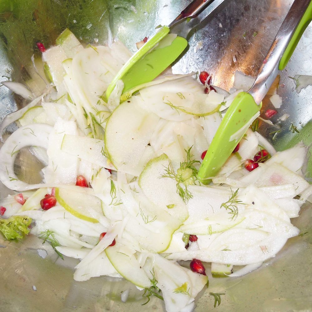 salty sweet apple fennel salad with pomegranate seeds