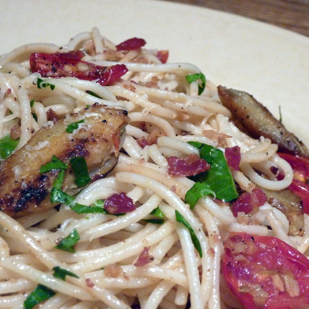 pasta with fried artichoke chips, pancetta, roasted tomatoes and lemon breadcrumbs