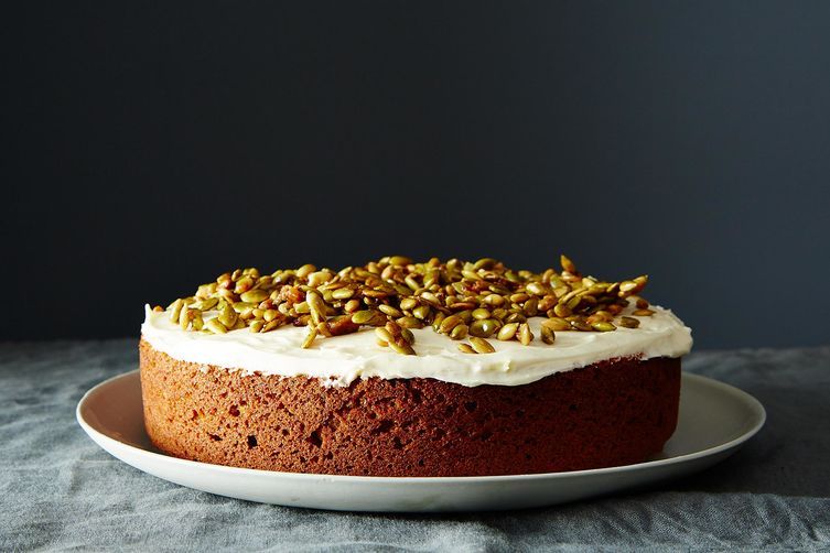 Pumpkin Cake with Cream Cheese Icing and Caramelized Pumpkin Seeds