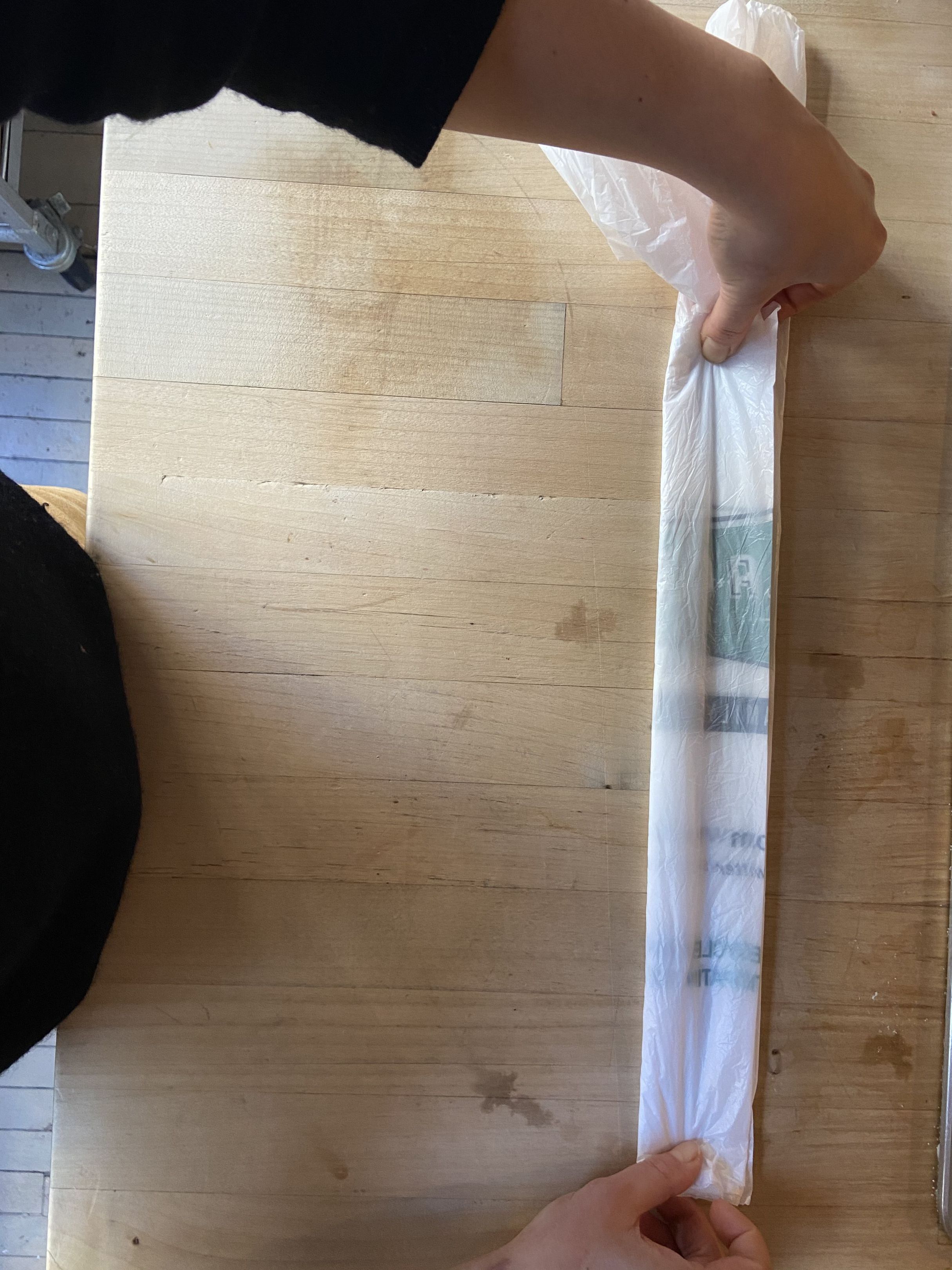 A Neat Folding Trick for Storing Plastic Grocery Bags—So You Can Actually Reuse Them