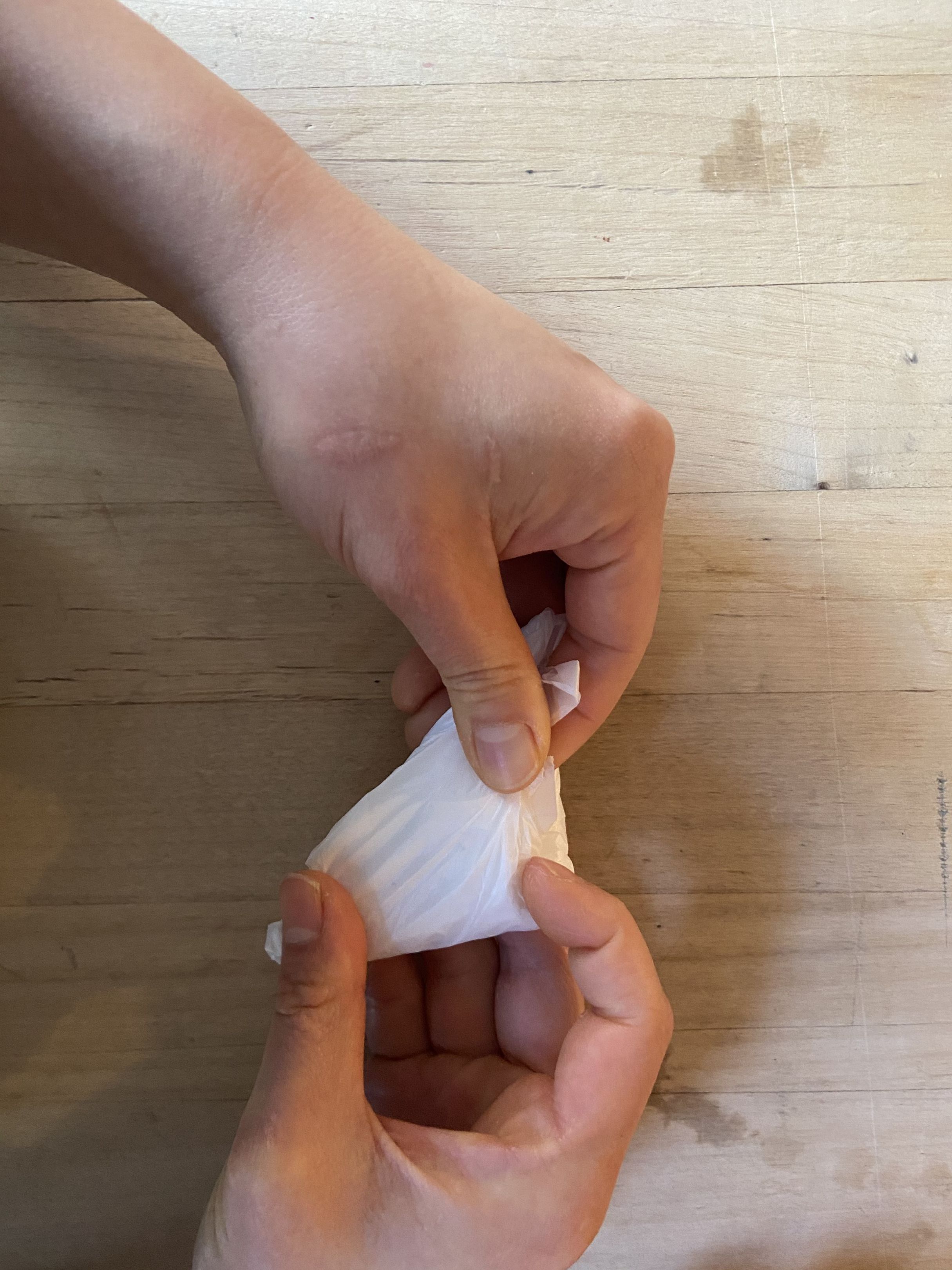 A Neat Folding Trick for Storing Plastic Grocery Bags—So You Can Actually Reuse Them