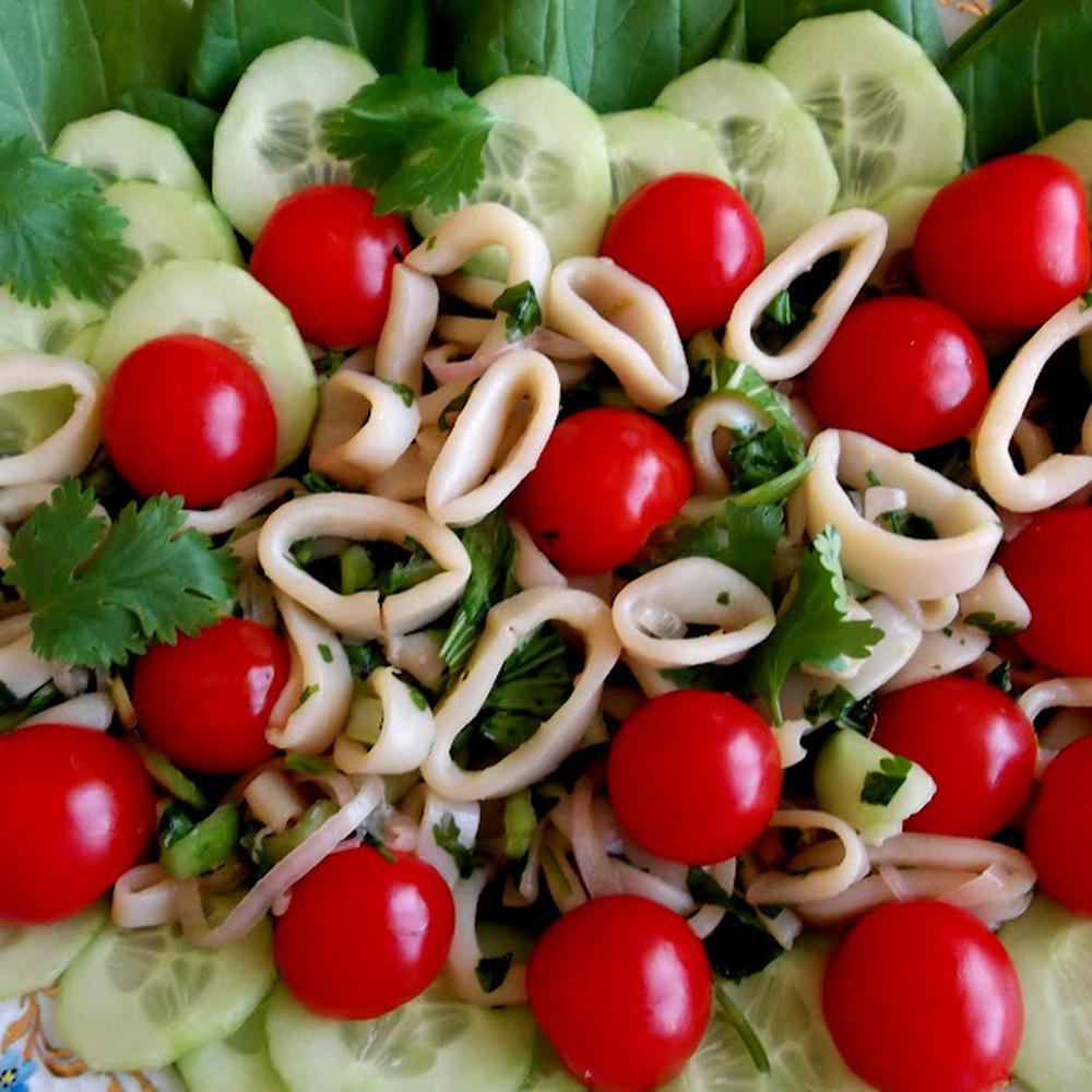 braised calamari, stir-fried bok choy salad with cucumber and cherry tomatoes