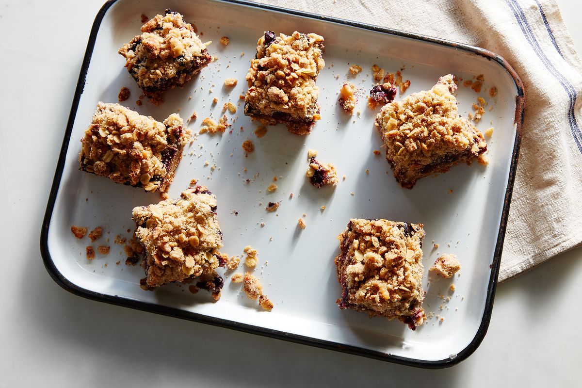 This recipe's soft, mixed berry-filled bars are topped with a not-too-...