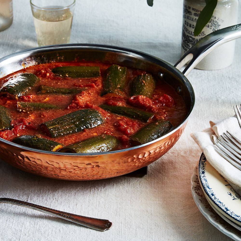 stuffed zucchini simmered in tomato sauce (zucchine ripiene alla romana)