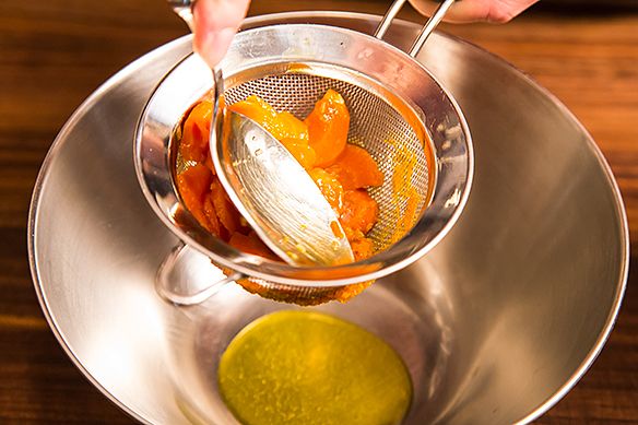 Carrots in a sieve