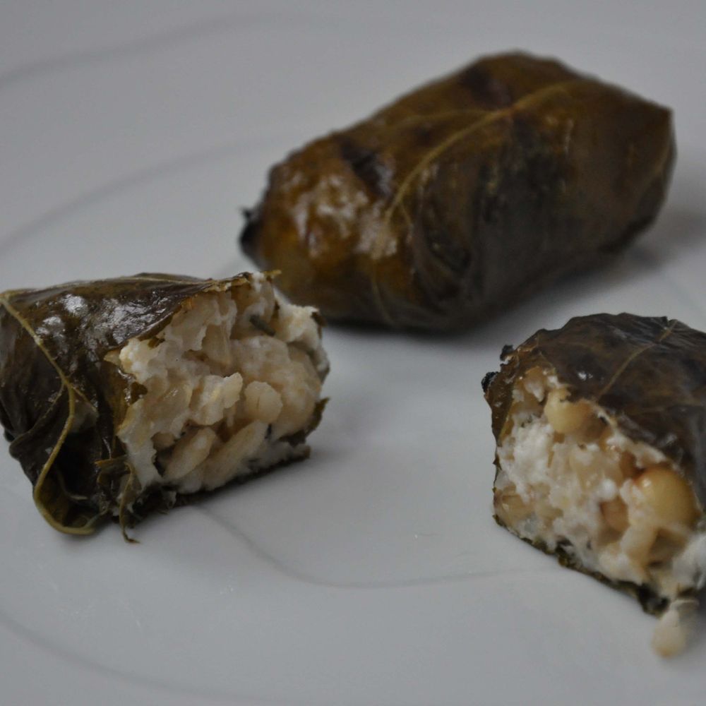 grilled grape leaves stuffed with lemony goat cheese