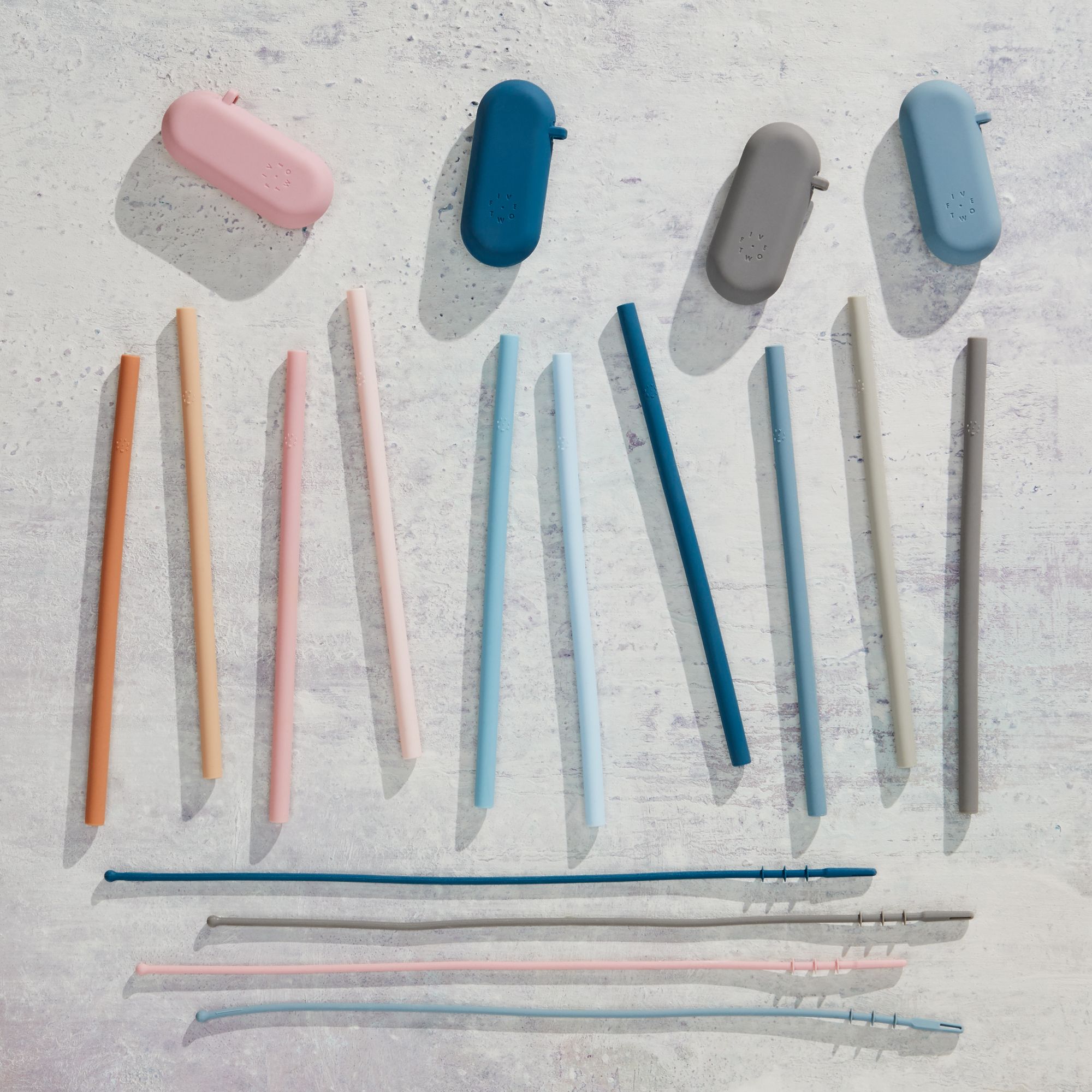 Colorful silicone straws with straw cleaners.