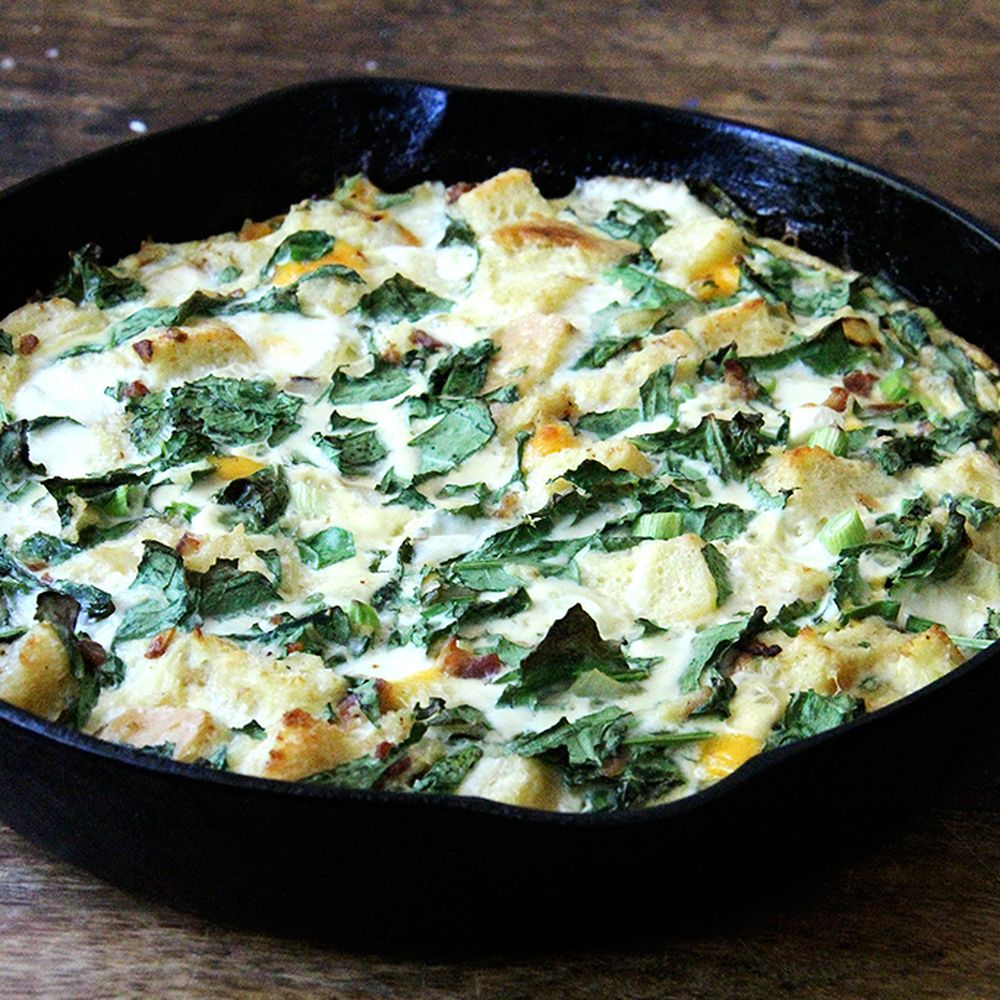 skillet strata with bacon, cheddar, and greens