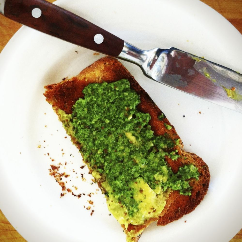 whole wheat toast with avocado butter and sorrel pesto