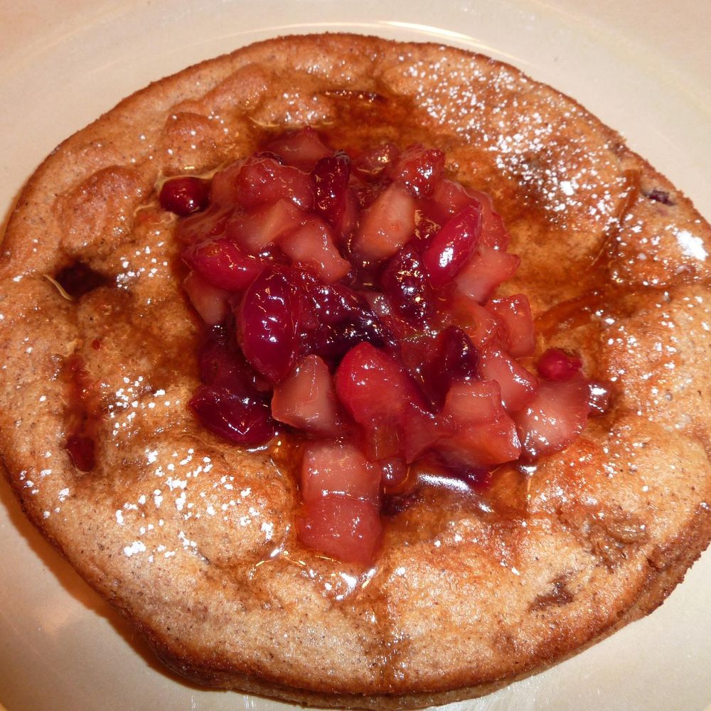Cranberry spiced pancake souffle with a cranberry apple maple compote