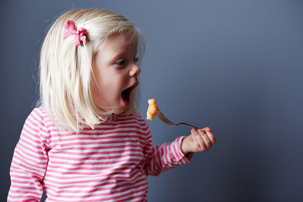 Little Girl Eating Pasta