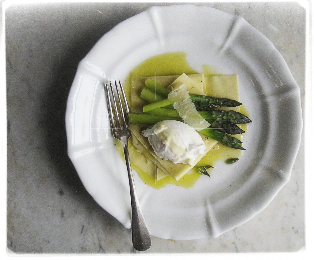 Sheets of pasta dressed with lemon butter, asparagus, poached egg, and parmigiano