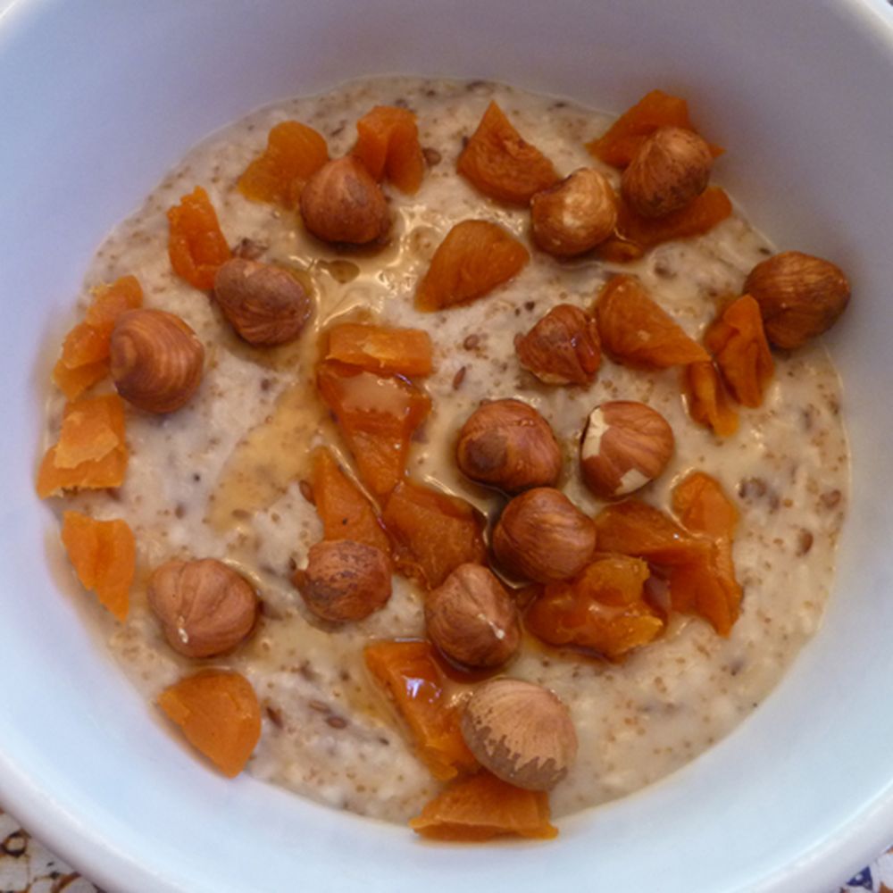 scottish oatmeal breakfast with teff grain and flax seeds